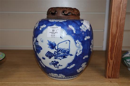 An 18th century Chinese blue and white jar and cover, the cover with inlaid jade plaque overall height 24cm